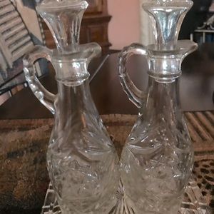 Vintage oil and vintage crystal bottles.